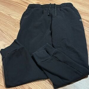 Men’s medium Zelos jogger warm sweatpants. Very small tear noted- black